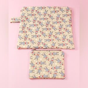- 2 zipper cosmetic sock monkey bags for coins, travel, makeup or gifts.